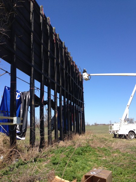 man up in air in cherry picker